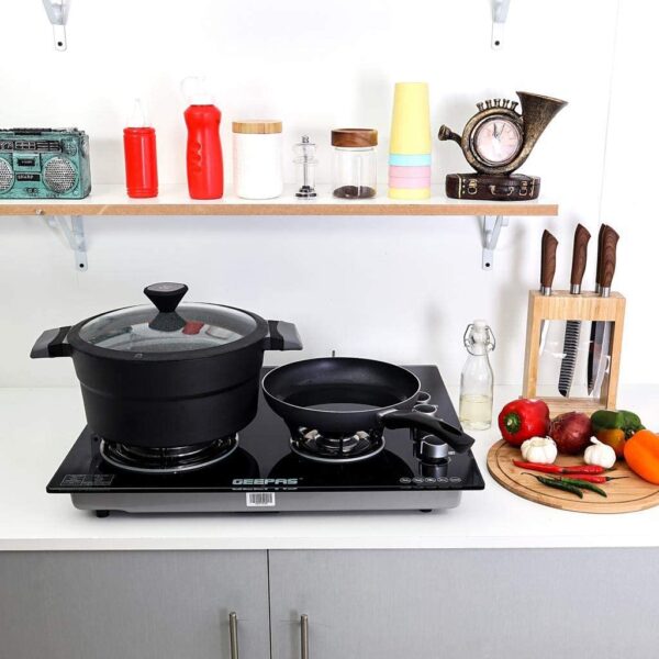 Geepas 4 Burners Gas Cooker with 2-in-1 Built-in Gas Hob 8 mm tempered glass worktop Stainless steel tray Four energy burners Burners size : 130 mm + 100 mm + 70 mm + 50 mm Color: black
